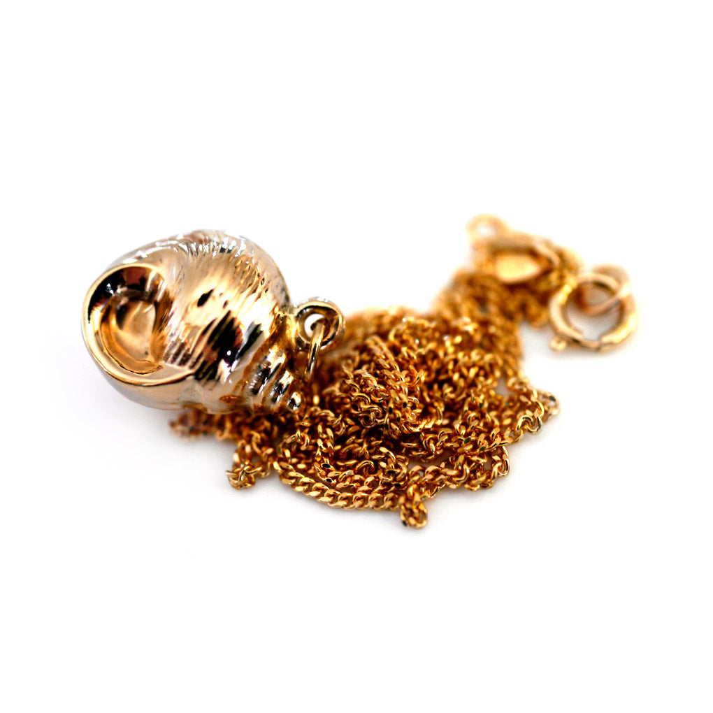Gold Glorious Gold: 1968 Conch Shell Pendant