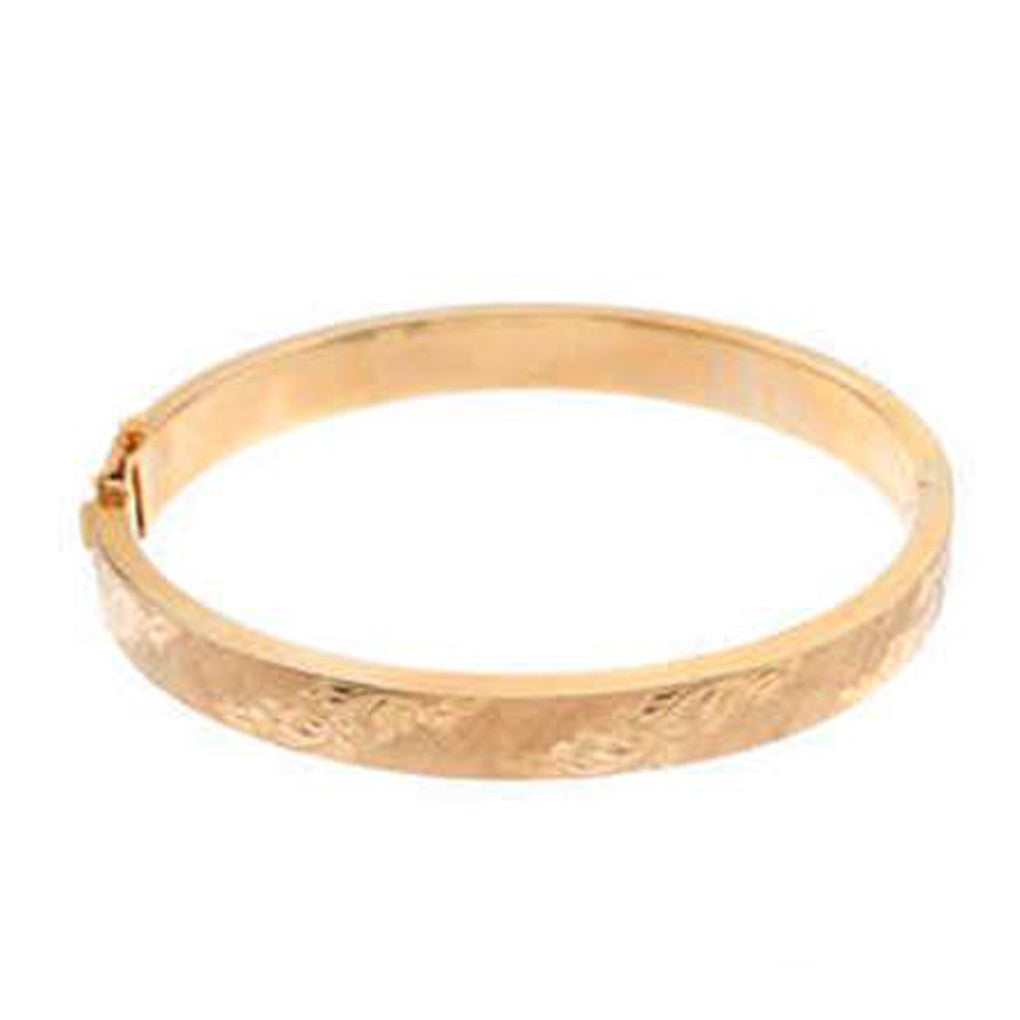 Gold Glorious Gold: 1964 Bangle
