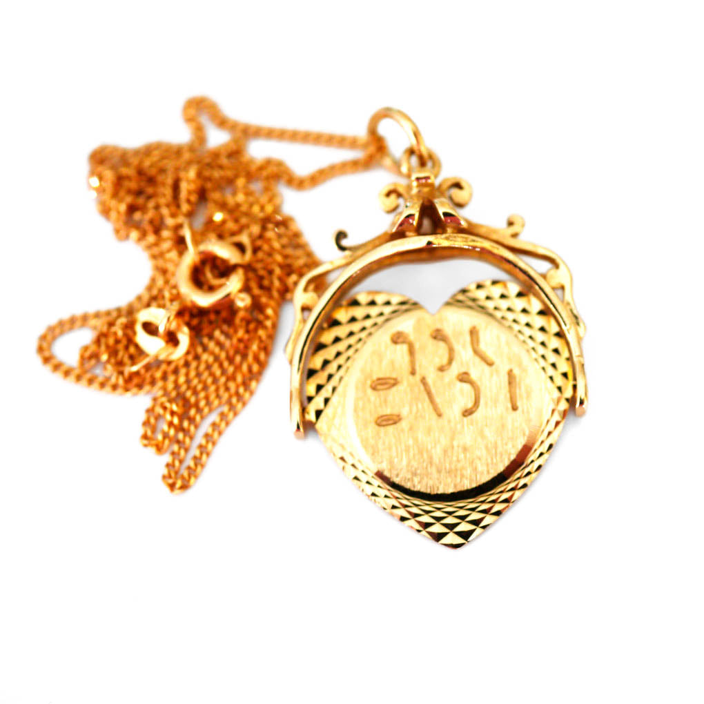 Gold Glorious Gold Heart Shaped Spinner Necklace 1970