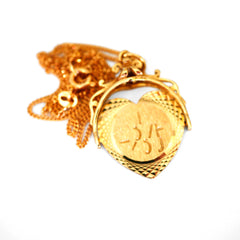 Gold Glorious Gold Heart Shaped Spinner Necklace 1970