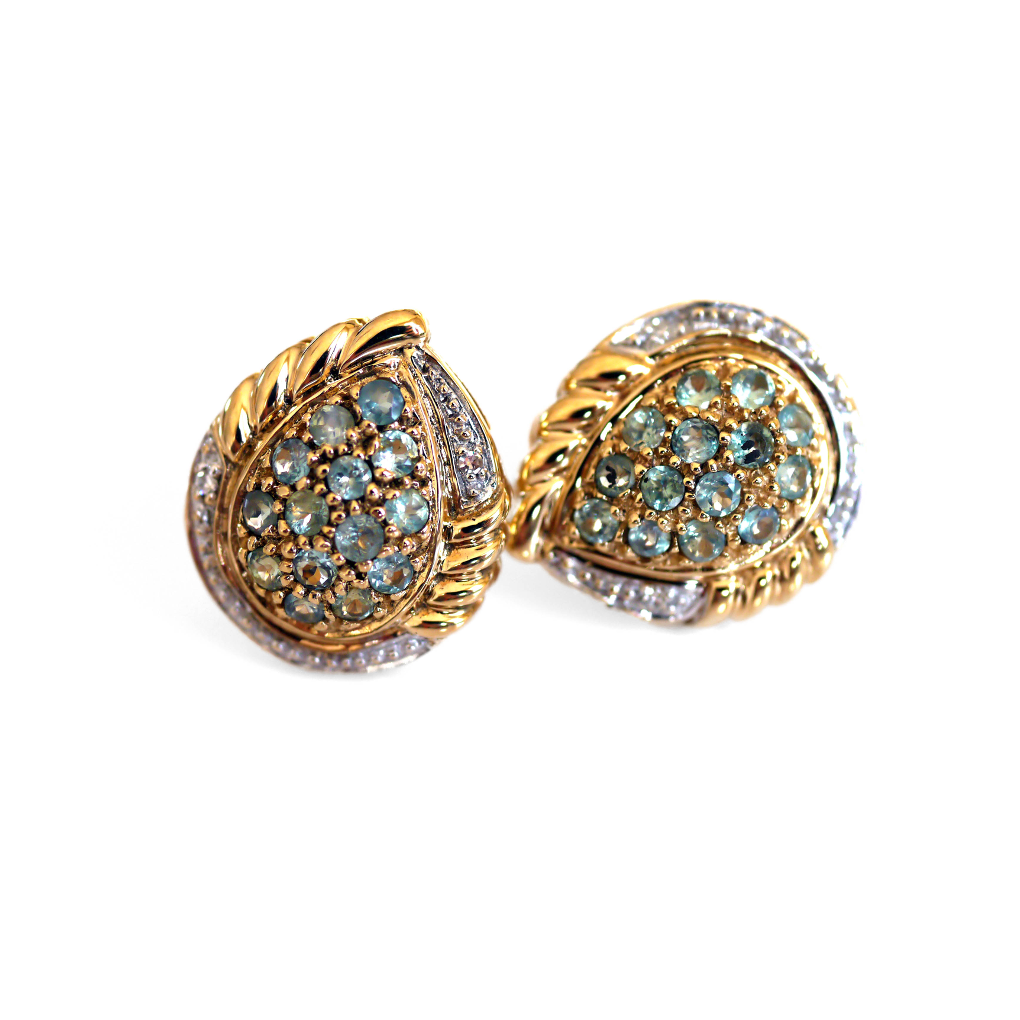 Alexandrite & Diamond Foliate Earrings photographed on a white background