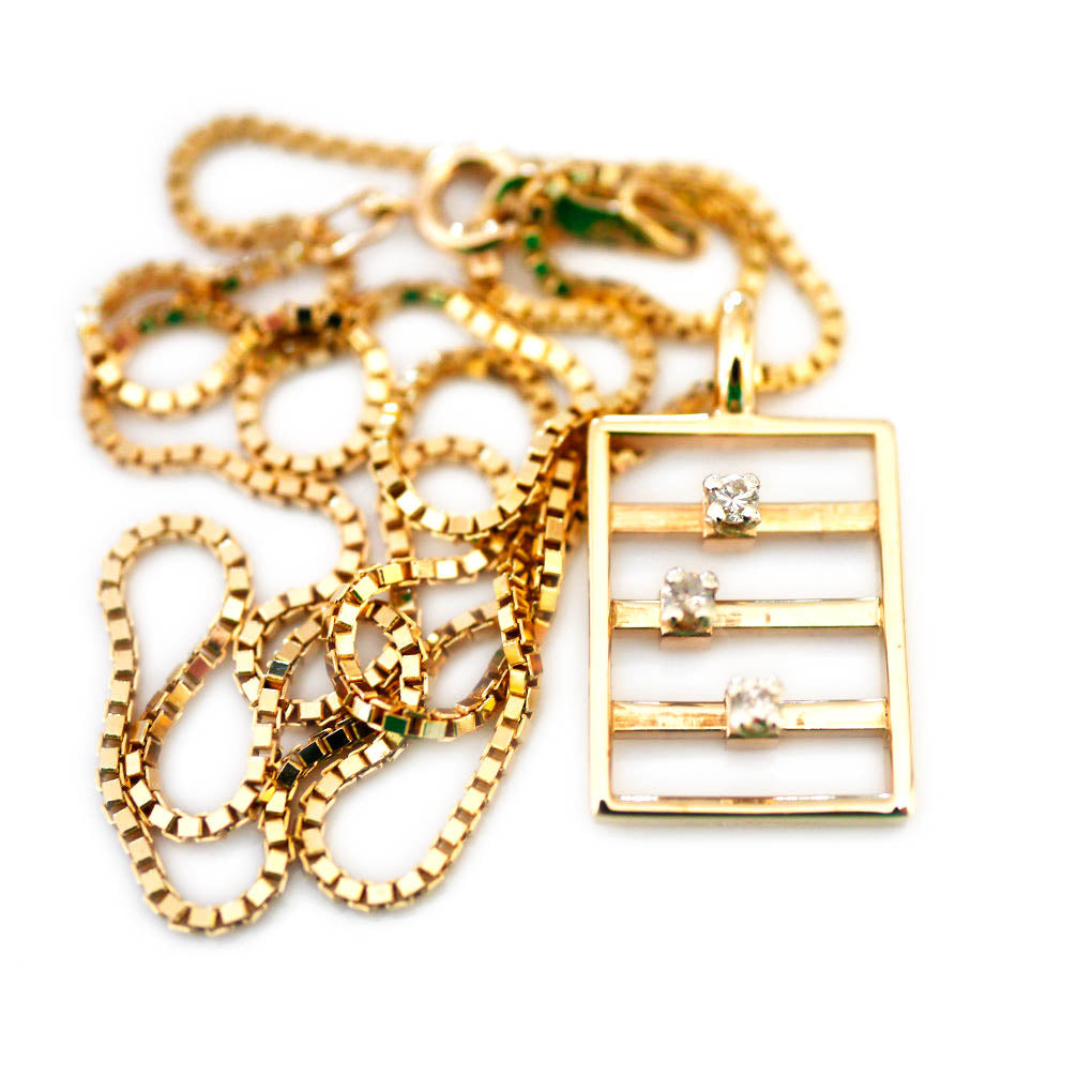 Articulated Dazzling Diamond Abacus Necklace 1967 photographed on a white background