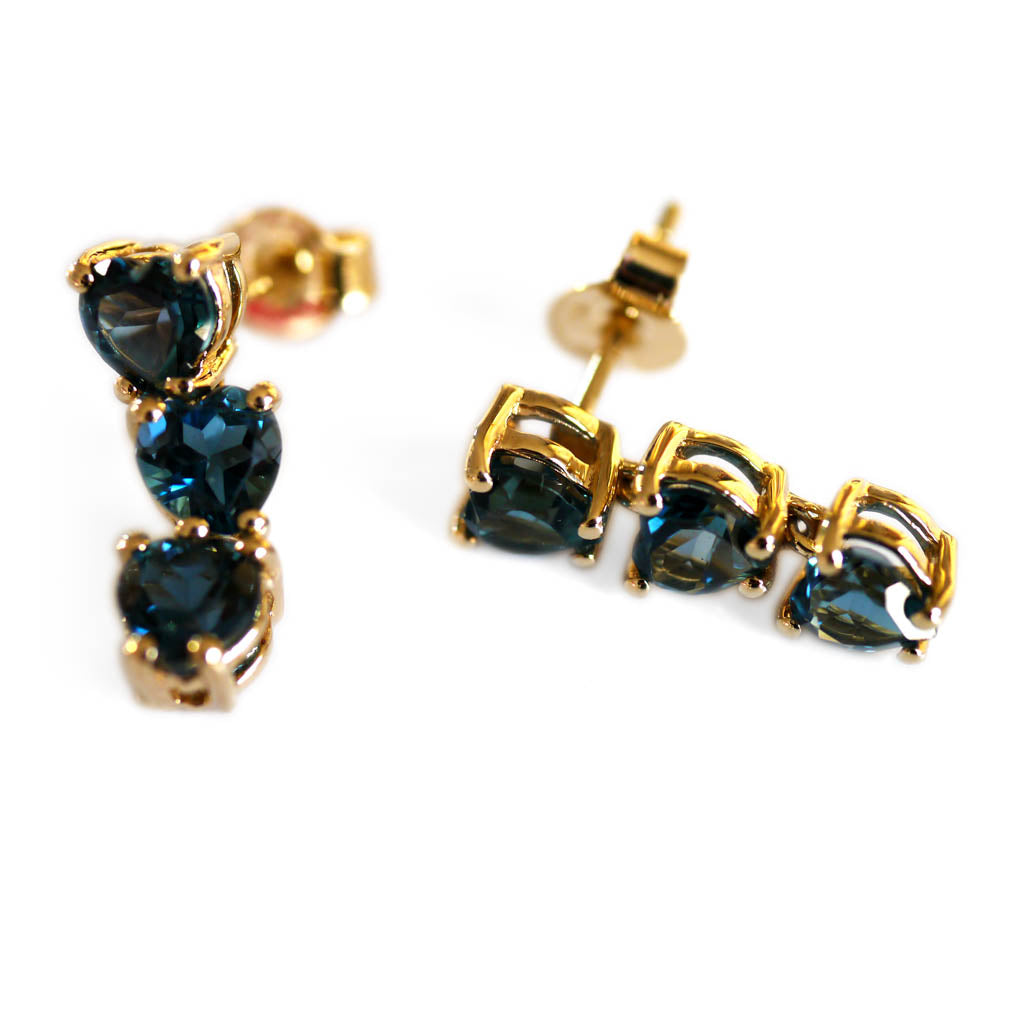 Blue Topaz Triple Heart Cocktail Earrings
