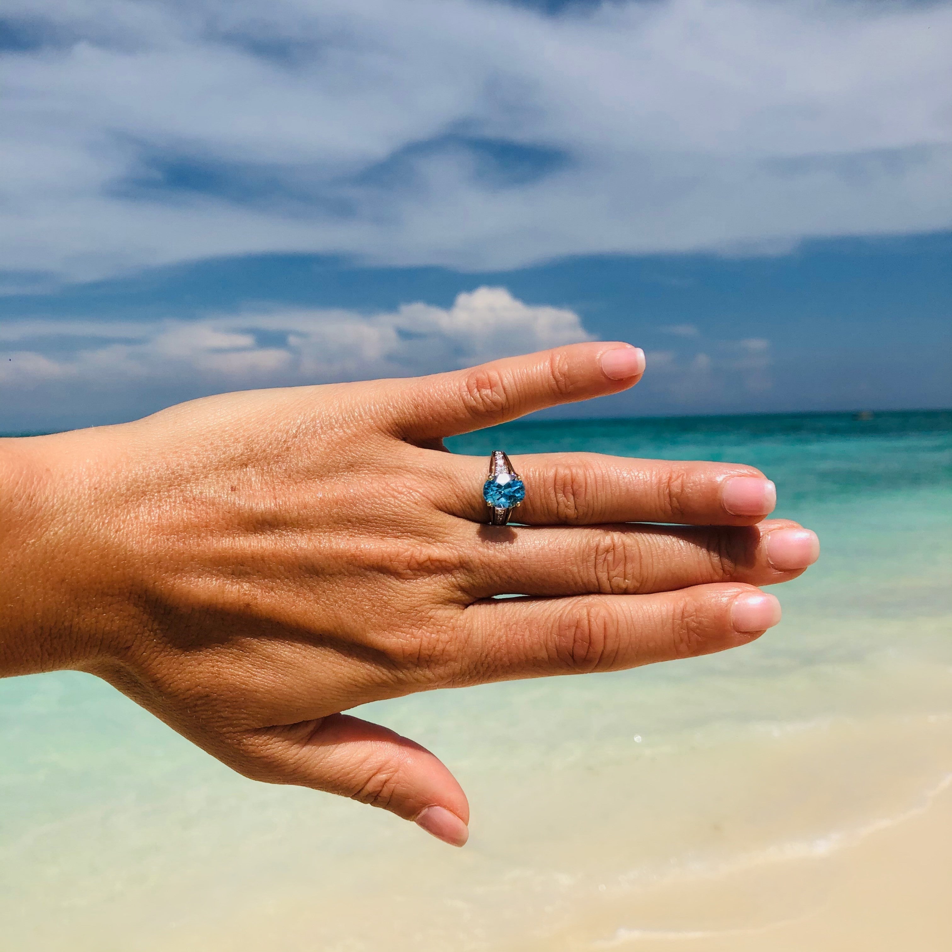 Blue Topaz & Diamond Ring