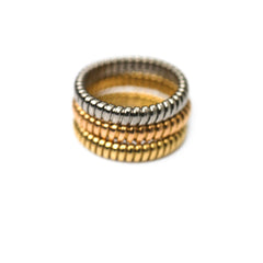 The Tubogas Trio Tri-Gold Stacking Rings
