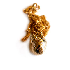 Gold Glorious Gold: 1968 Conch Shell Pendant