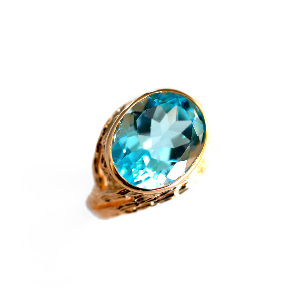 Vintage 1970s Blue Topaz Dress Ring photographed on a white background