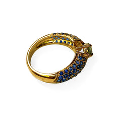 Blue and Green Sapphire Ring photographed on a white background