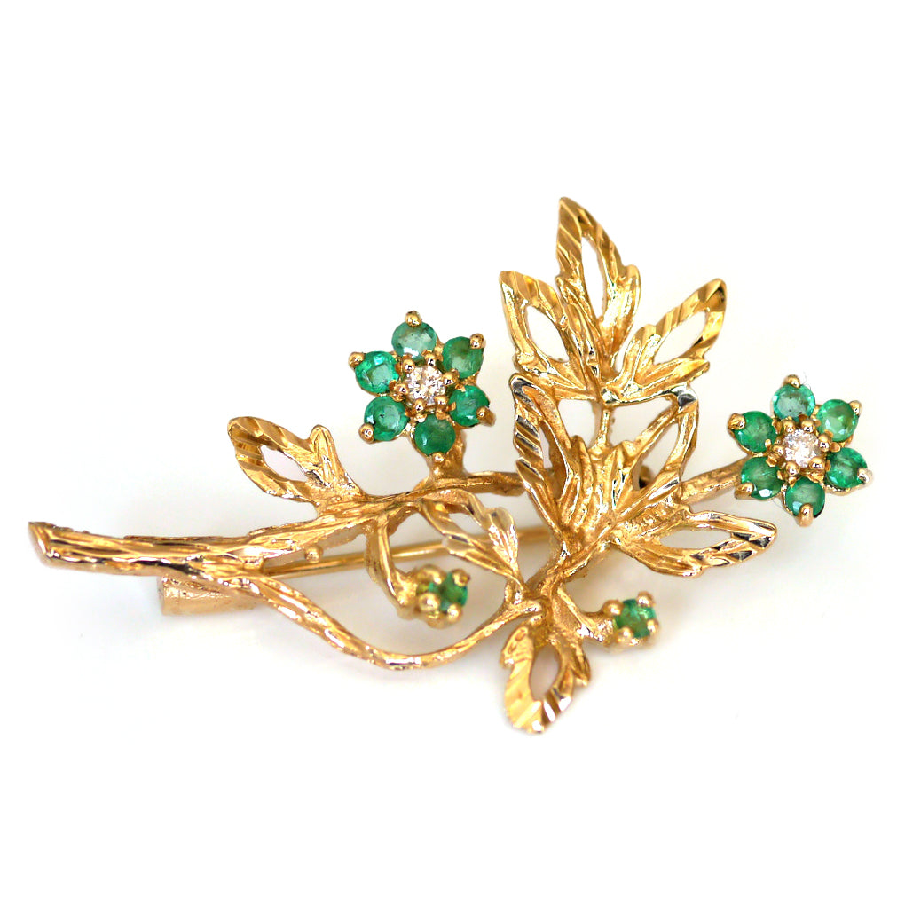 Elegant Emerald and Diamond Flower Brooch