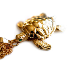 Vintage Emerald Eyed Gold Articulated Turtle Pendant